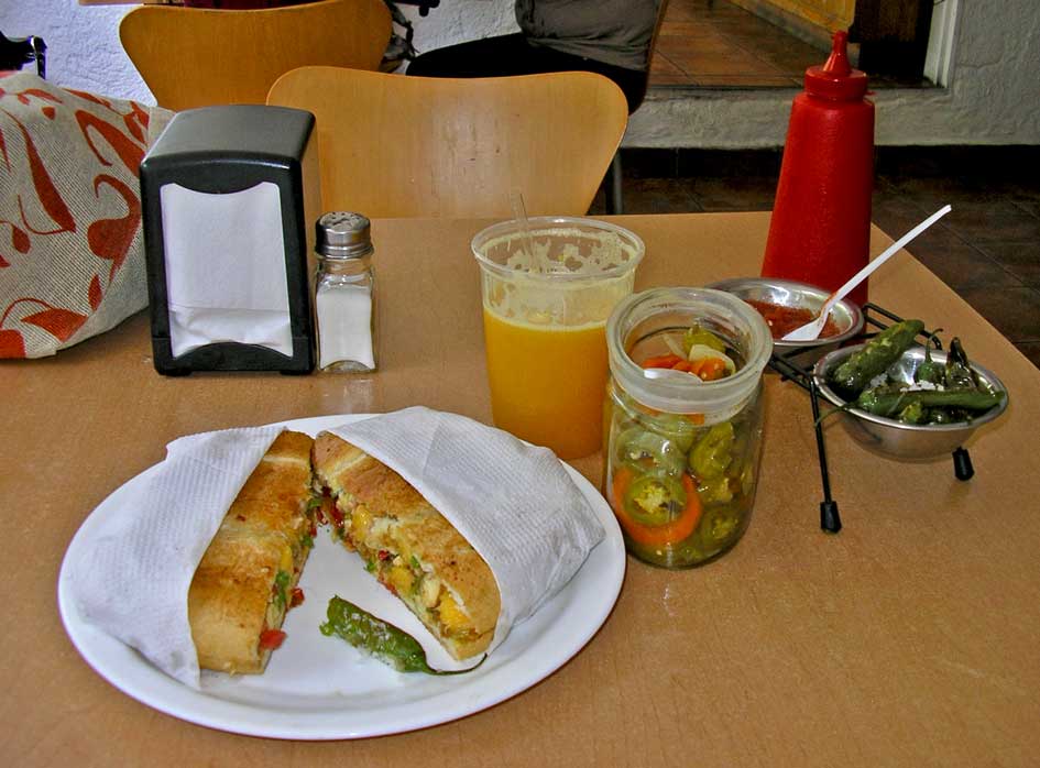 A torta Moreliana, fresh orange juice and all the trimmings at Juanitos