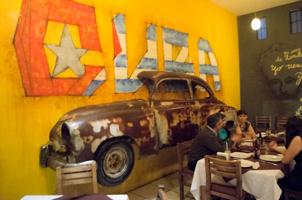 Yes, that actually is the shell of a Chevy on the wall in one of the two dining rooms.